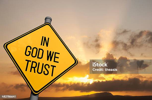 In God We Trust Road Sign Stock Photo - Download Image Now - In God We Trust, Advice, Black Color