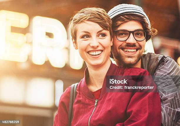 Couple Of Hipsters Embraced On Alexanderplatz Stock Photo - Download Image Now - 20-24 Years, Adult, Alexanderplatz