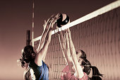 Volleyball players in action.
