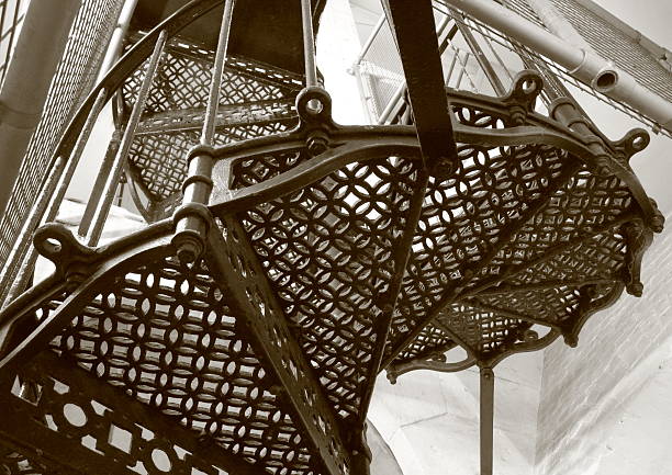 istock Upward look at old metal stairway 482788955