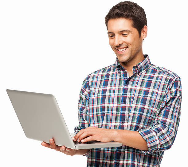 Young Man Using Laptop - Isolated stock photo