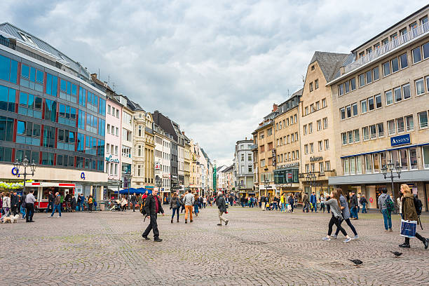 Bonn, Germany - June 20, 2015: market square in Bonn / Germany. Many restaurants and shops are located around this place. Many tourists are around.