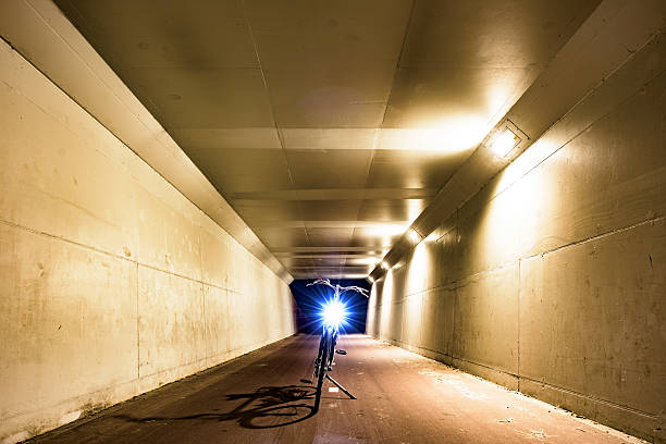 istock Perspective view of a tunnel with a parked bicycle 482794184