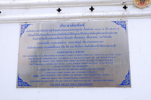 Bangkok Thailand - April 20, 2015: Grand Palace information board at the entrance of Grand Palace in Bangkok Thailand.