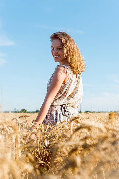 istock Woman in wheat field 482802018