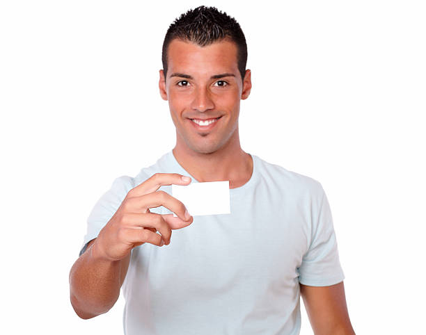 istock Latin man holding up a blank card 482802027