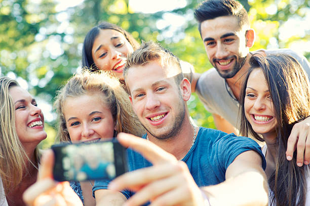 istock Friends taking a self portrait picture 482803599