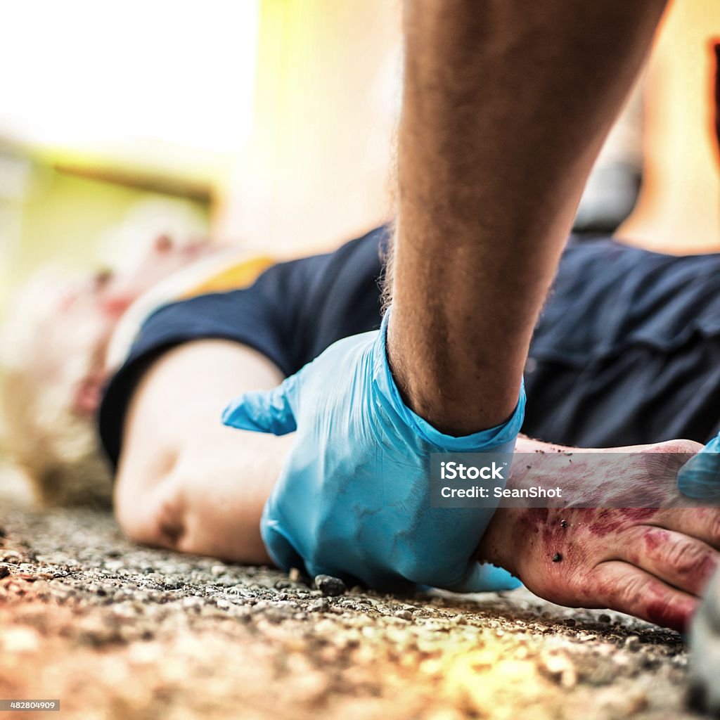 Emergency service rescuing a victim of an accident  Paramedic Stock Photo