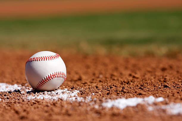 Baseball in the Infield Baseball on the Chalk Line of the Infield Baseballs stock pictures, royalty-free photos & images