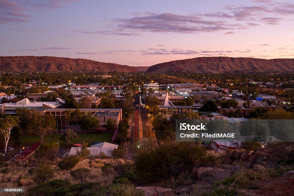 View over Alice Springs View from Anzac Hill down Hartley St on a fine winter's evening in Alice Springs, Northern Territory, Australia Alice Springs Stock Photo