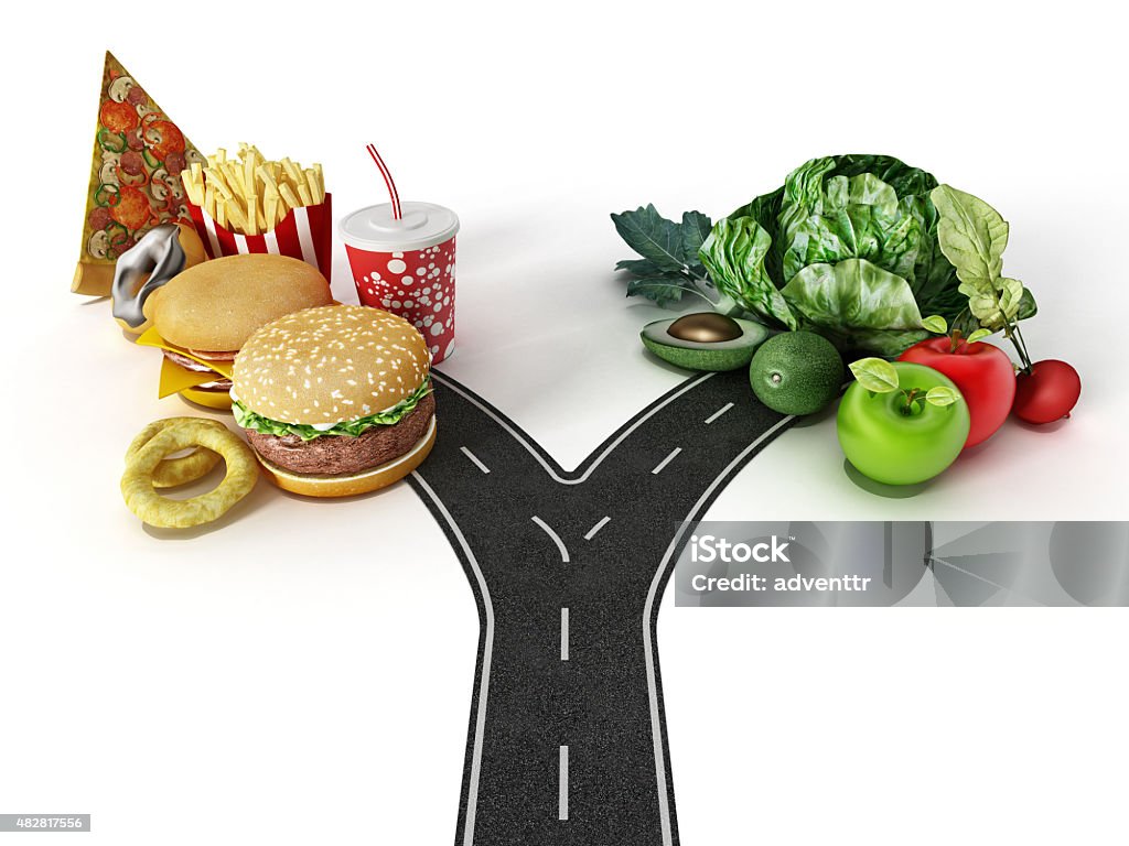 Choice between fast food and healthy food Road with a choice between fast food and healthy food. Healthy Eating Stock Photo