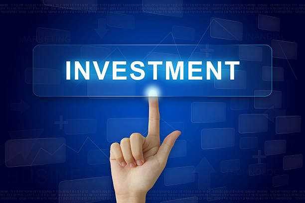 istock hand press on investment button on touch screen 482818216