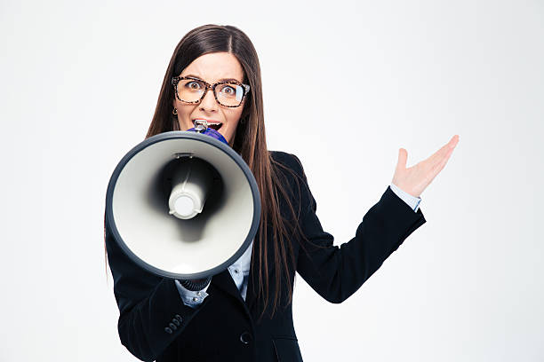 istock Businesswoman shouting in megaphone i 482819160