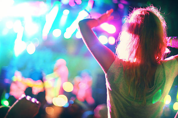 istock People enjoying a concert. 482819684