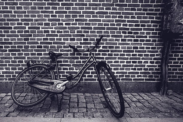 istock Unique classic vintage hipster bicycle leaning against the stree 482824180
