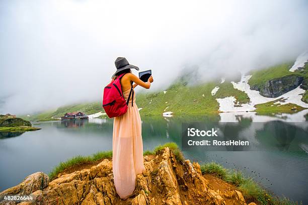 Traveler On The Mountain Lake Stock Photo - Download Image Now - 2015, Adult, Back