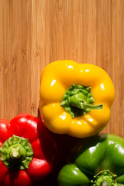 istock Fresh bell pepper on wooden table 482827076