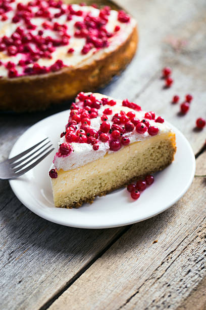 istock cheesecake with fresh red currants on a thin wooden background 482827692