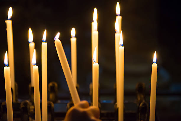 istock Candles in the church 482831952