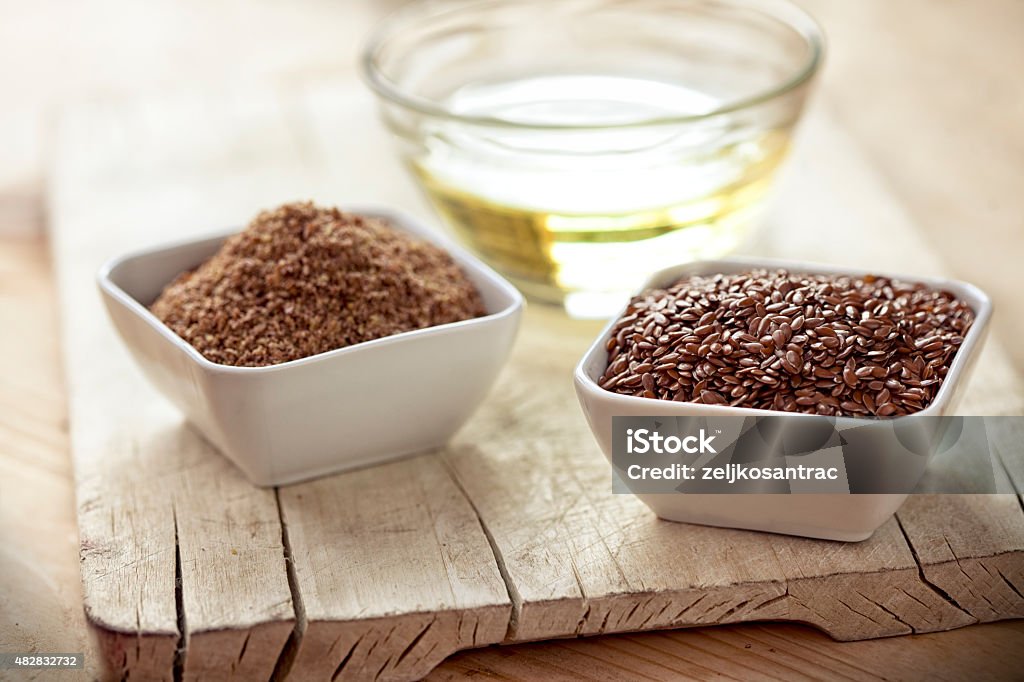 Linseed oil and flax seeds Flax Seed Stock Photo