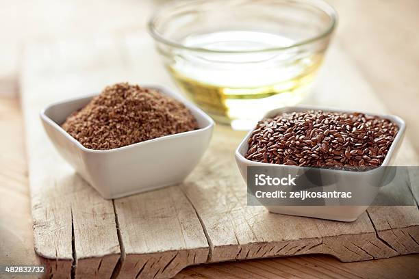 Linseed Oil And Flax Seeds Stock Photo - Download Image Now - Flax Seed, Cooking Oil, 2015