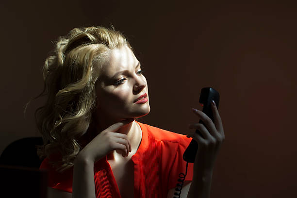istock Serious female secretary with phone 482832774