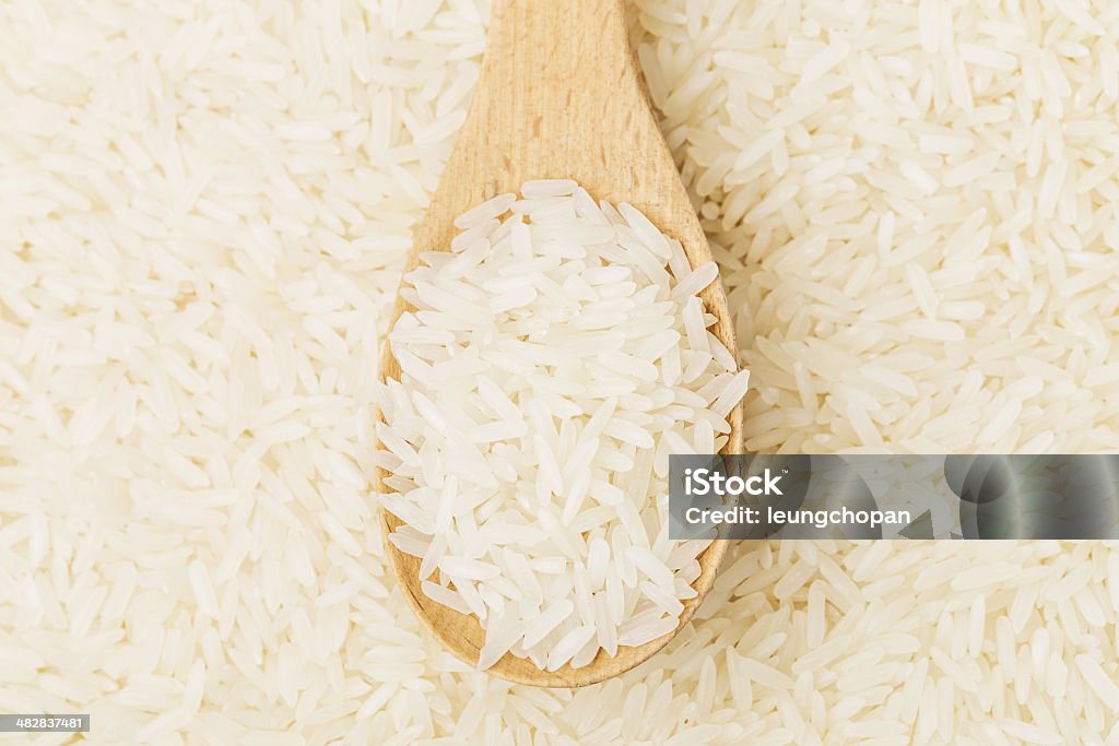 A Spoon For Rice Uncooked Rice On Spoon Stock Photo - Download Image Now - Agriculture ...