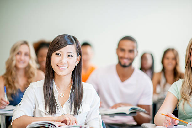 istock Female College Student in Class 482837916