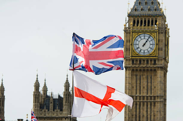 istock Big Ben with Union Jack and England flag 482838113