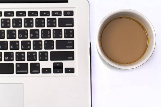istock Over view laptop computer, a cup of coffee 482839631