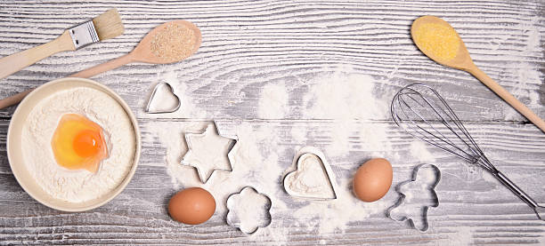 istock ingredients and molds for baking cookies on wooden background 482839795