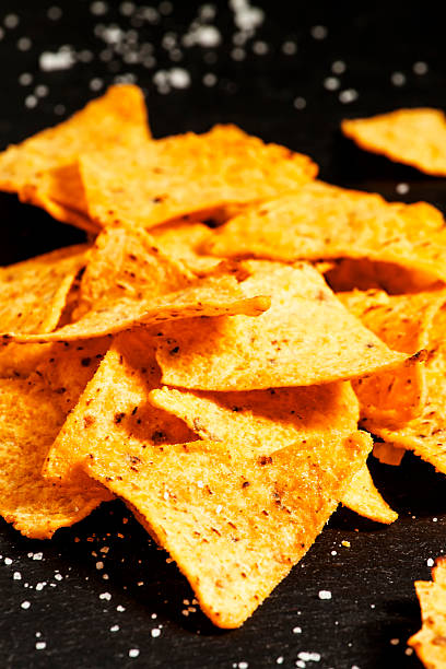 istock Nachos and salt on a dark background 482841030