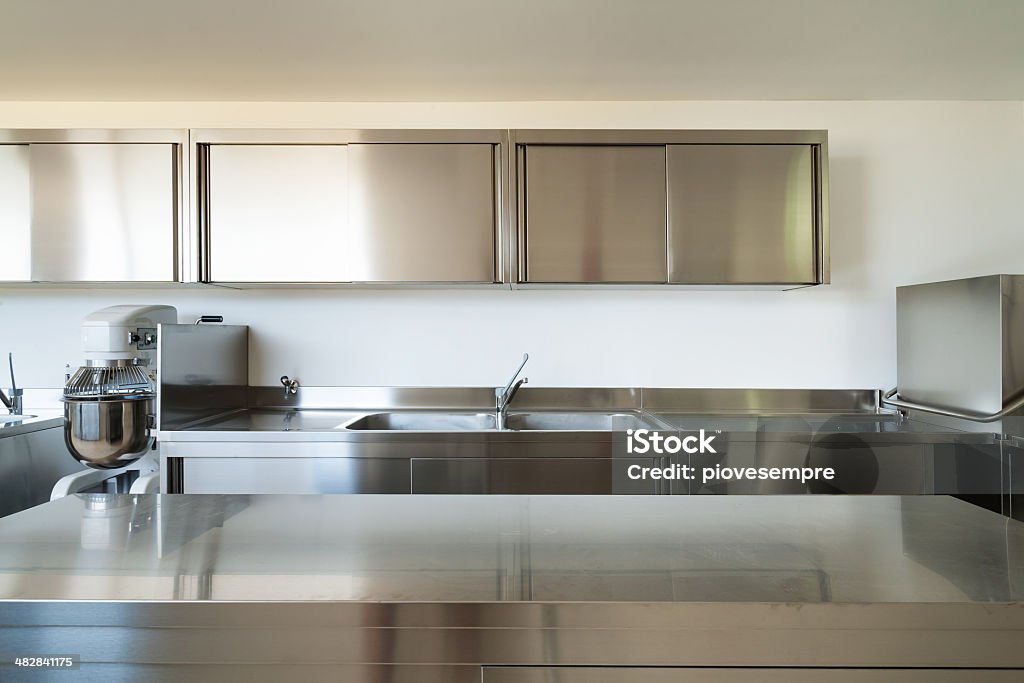 interior, professional kitchen Professional kitchen, view counter  in steel Commercial Kitchen Stock Photo