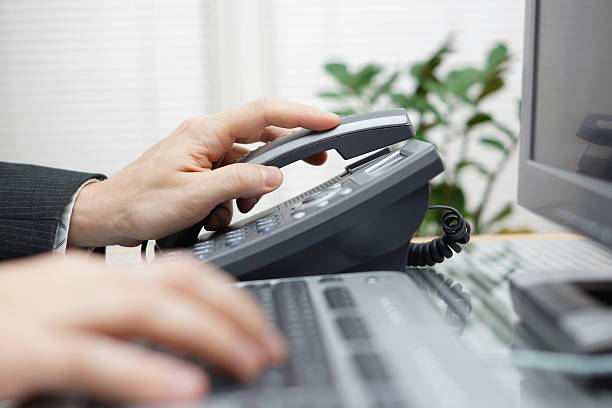 istock businessman is answering the phone 482853315