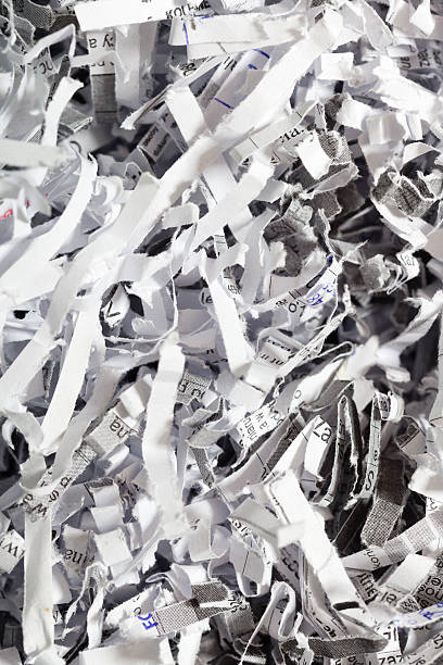 istock Closeup of shredded paper as abstract background 482853635