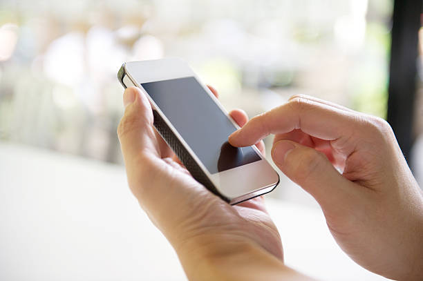 istock Hand pressing touch screen of smart phone 482855501