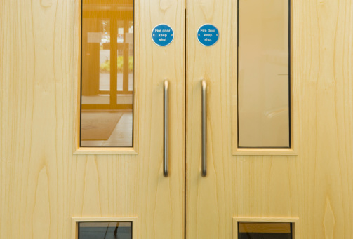 Close up of modern wooden office doors.