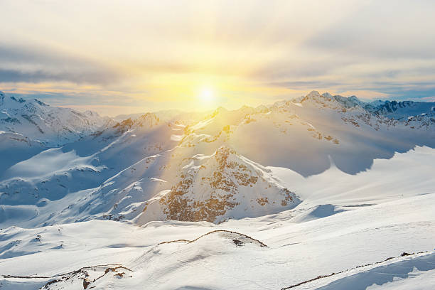 istock Sunset in snowy blue mountains 482858768