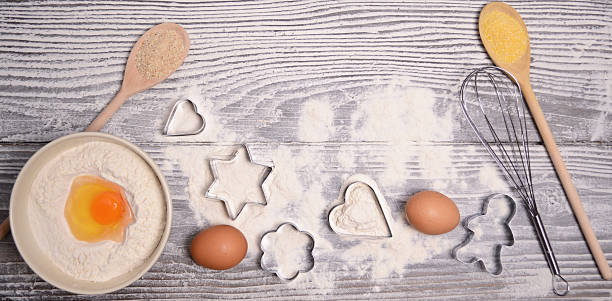 istock ingredients and molds for baking cookies on wooden 482858851