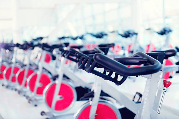 istock exercising bikes at the gym 482858925