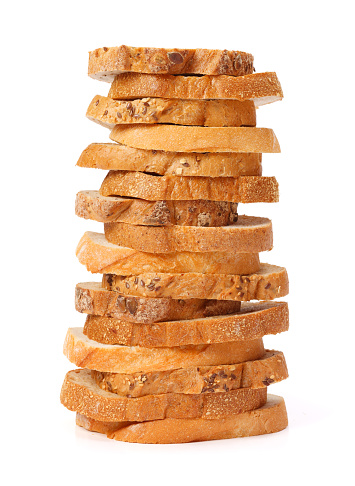 Stack of bread slices on white background