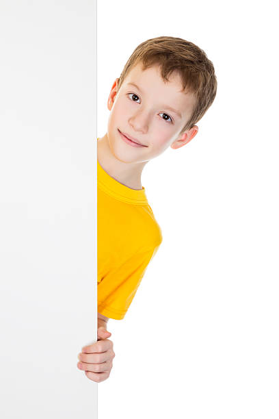 istock Boy peek out from vertical white banner 482859695