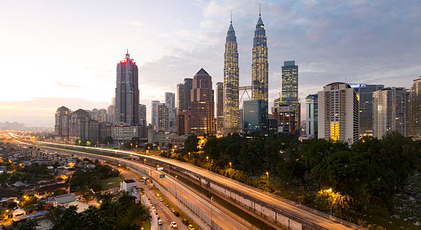 istock kuala lumpur cityscape panorama at sunrise 482865900