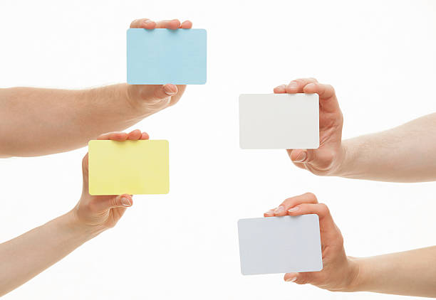 istock Human hands holding colorful paper cards 482868286