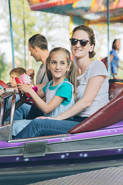istock Family in amusment park 482876660