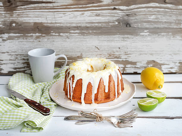 istock Moist lime and lemon bundt yoghurt cake, white rustic wooden 482878018