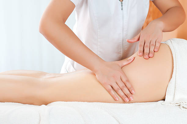 coxas de massagem - women human leg body buttocks imagens e fotografias de stock