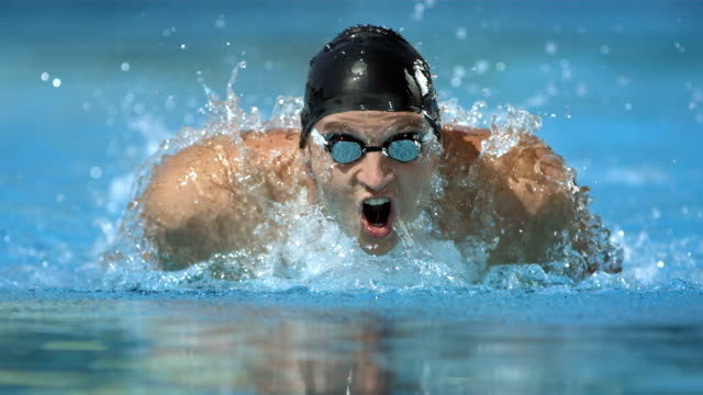 HD Super Slow-Mo: Swimmer Training The Butterfly Stroke