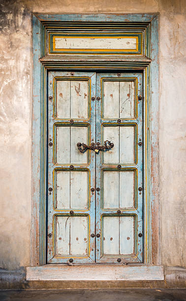 istock traditional old door on home wall 482880229