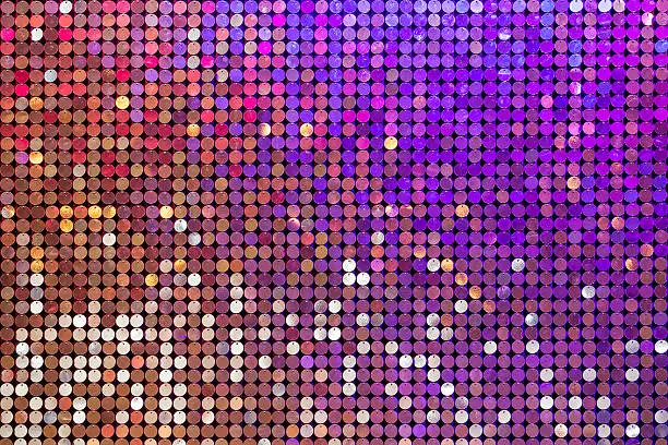 Beautiful abstract sparkles glitter background. Glittering sequins on the wall